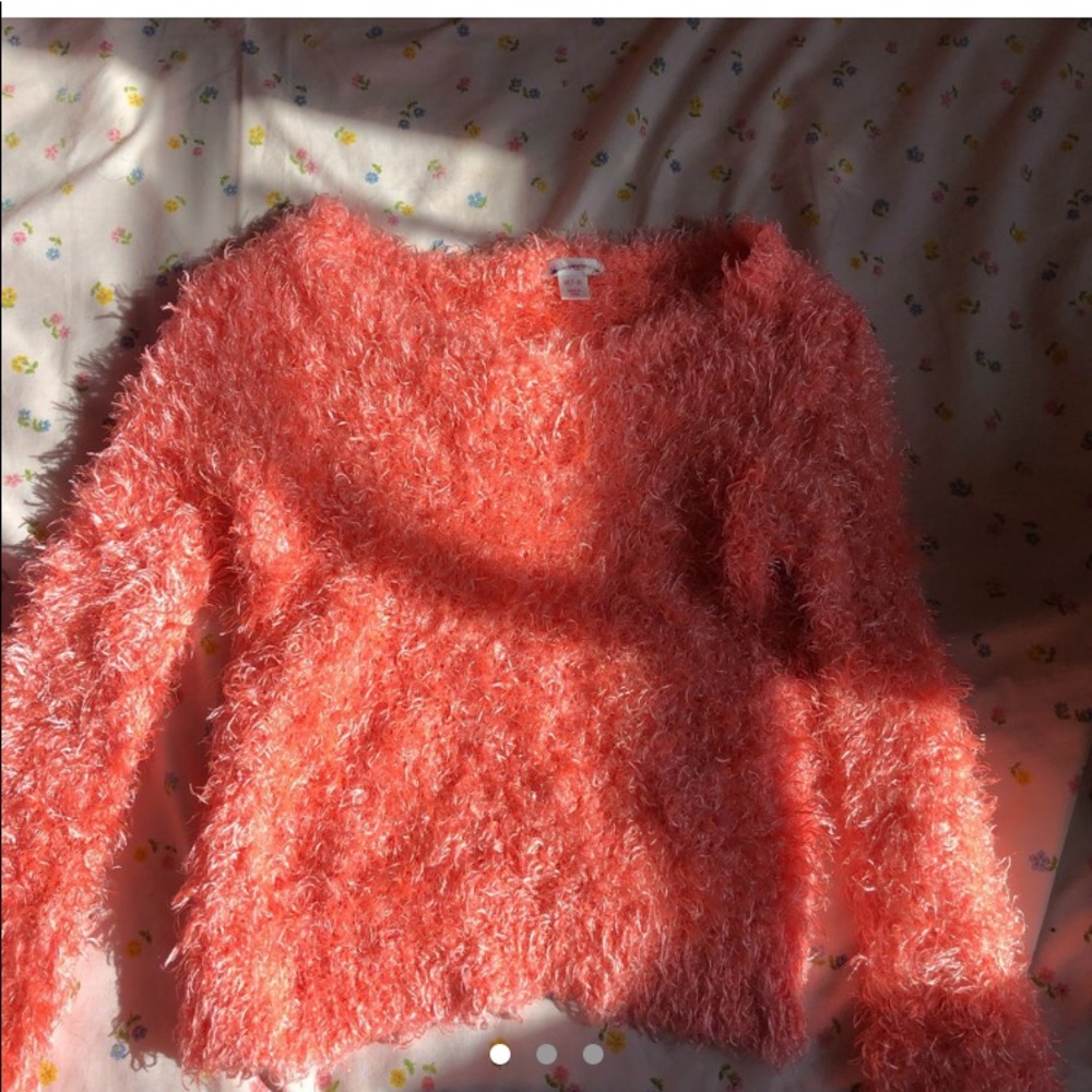 Cute fuzzy sweater, very bright, great for summer!